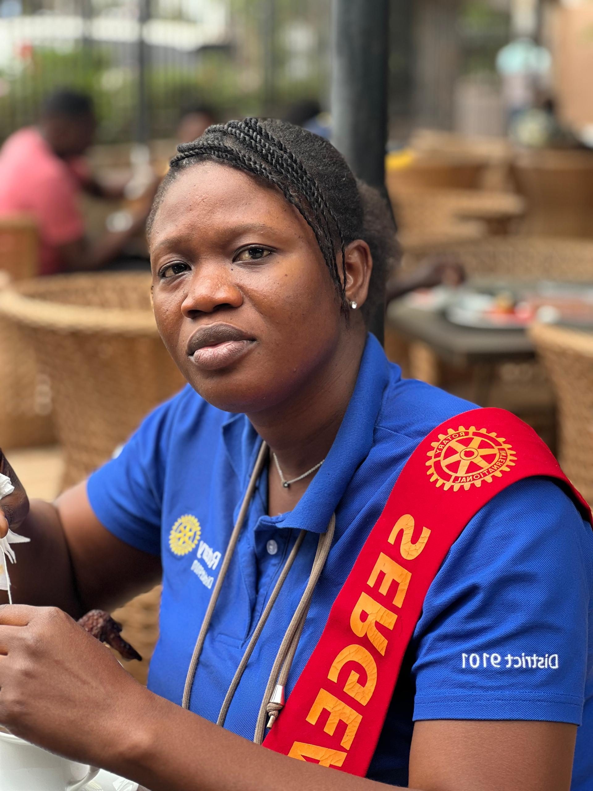 Gambian Lady focusing on camera